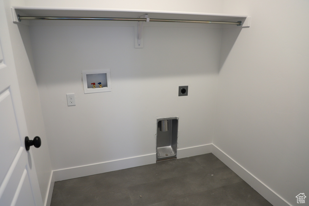 Laundry room with washer hookup, electric dryer hookup, and baseboards