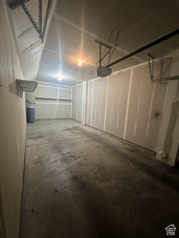 Garage featuring a garage door opener