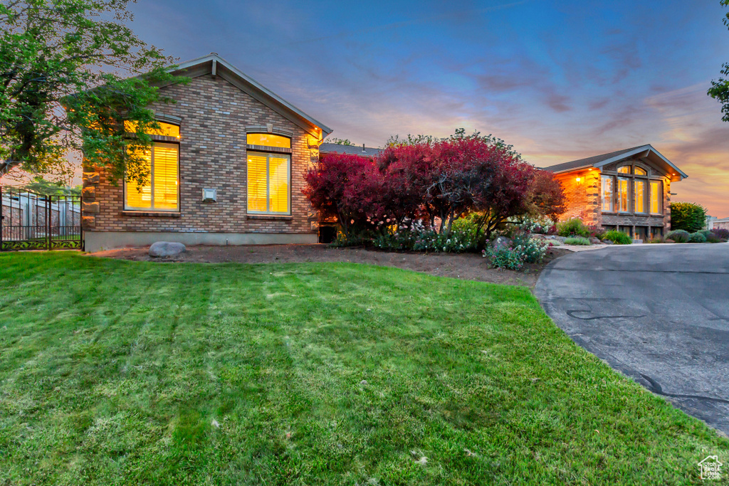View of front of home featuring brick siding