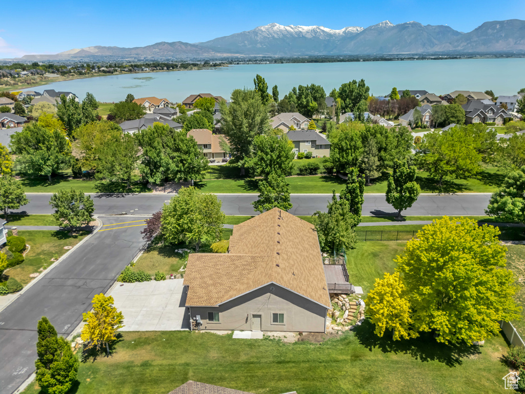 Aerial perspective of suburban area featuring a water and mountain view