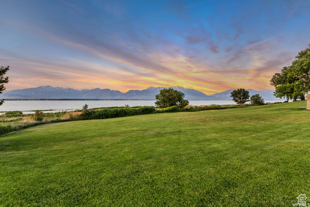 View of mountain backdrop with a large body of water