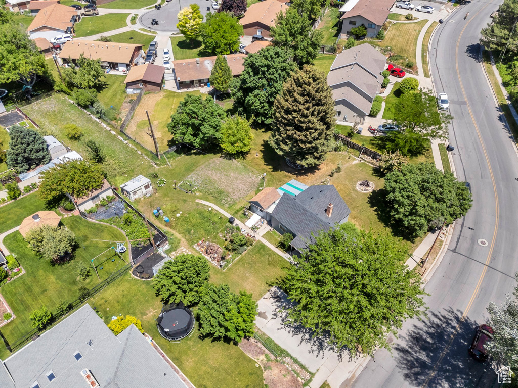 Aerial view of property\'s location with nearby suburban area