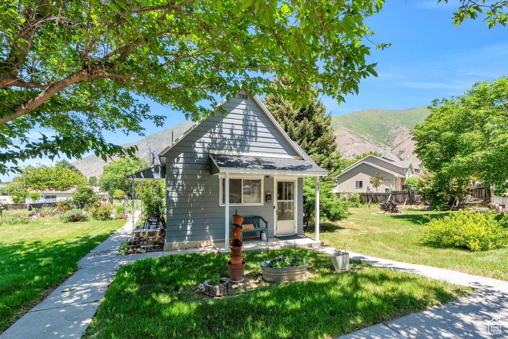 Bungalow featuring a mountain view