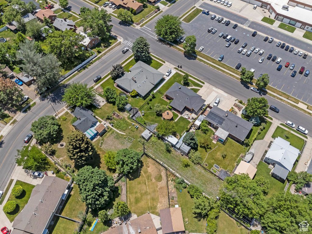 Aerial overview of property\'s location with nearby suburban area