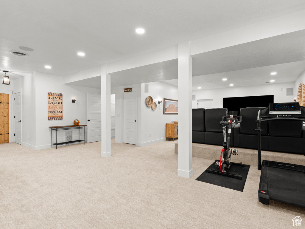 Workout area with carpet floors, recessed lighting, and baseboards