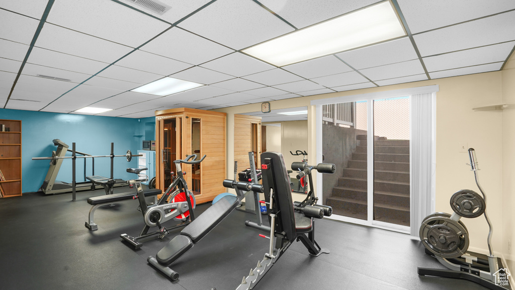 Exercise room featuring a drop ceiling