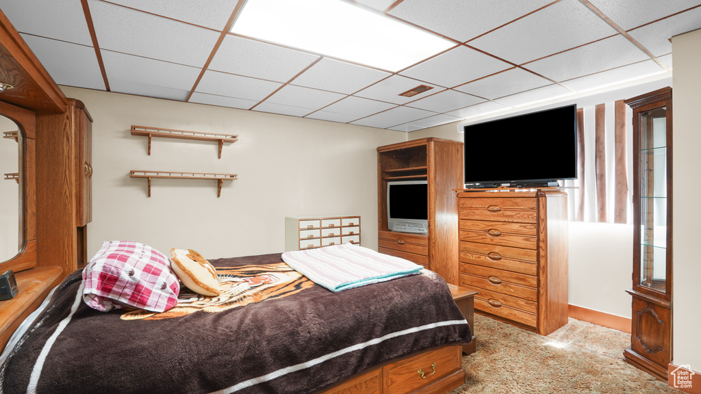 Bedroom featuring a drop ceiling