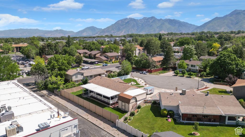 Aerial view of residential area with a mountainous background