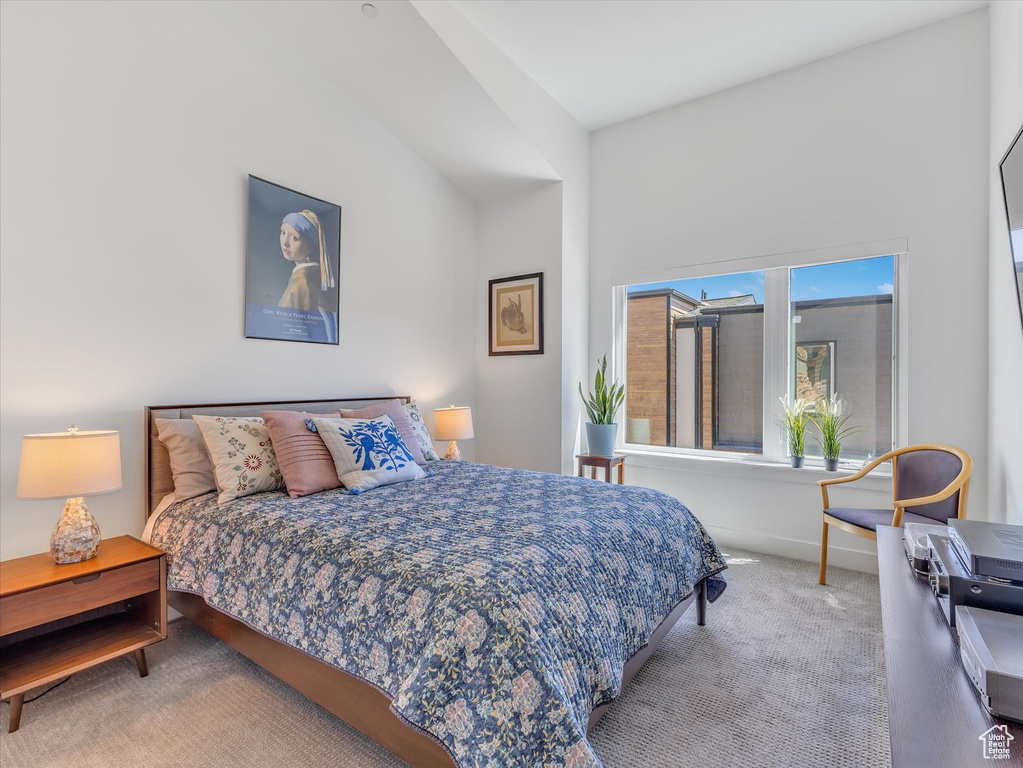 Carpeted bedroom with baseboards
