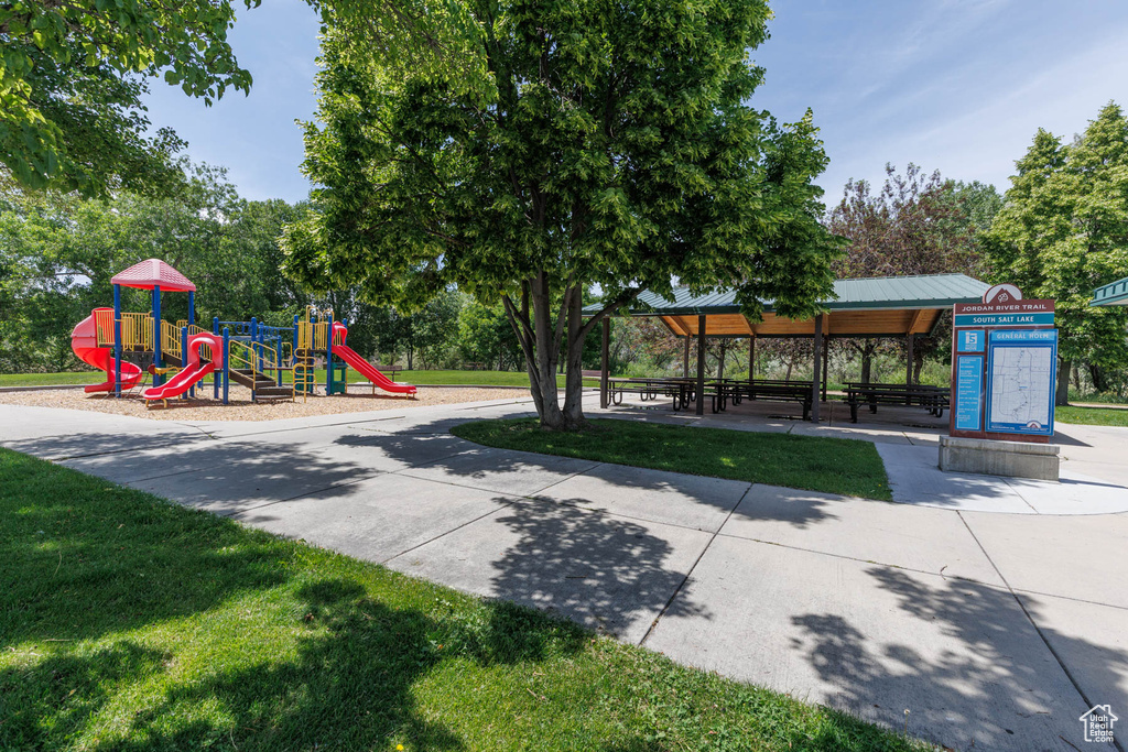 Community jungle gym featuring a gazebo and a yard
