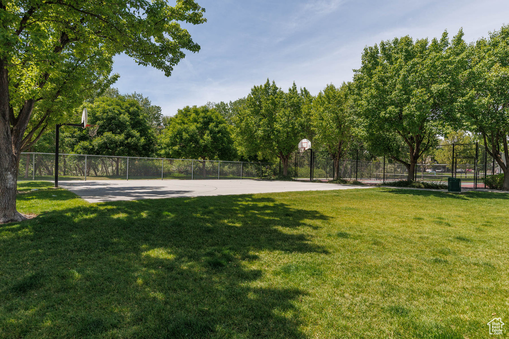 View of yard featuring community basketball court