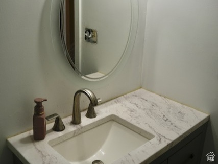 Bathroom featuring vanity and toilet