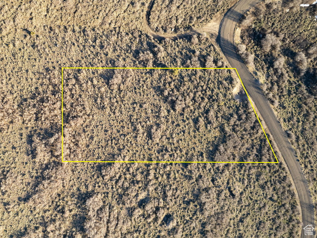 Aerial view of property's location featuring property parcel outlined