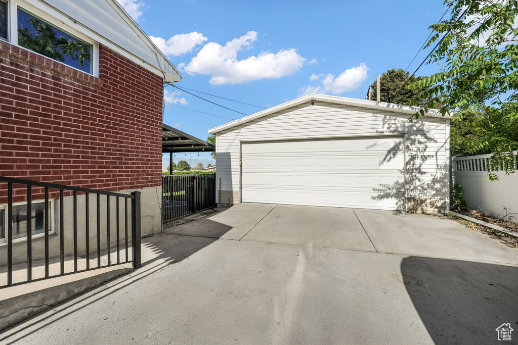 Detached garage with a gate