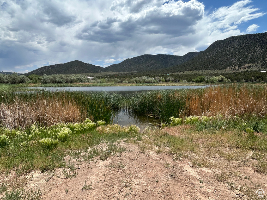 View of mountain backdrop with a large body of water