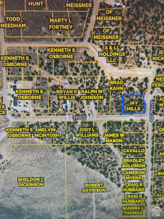 Aerial overview of property's location featuring property parcel outlined