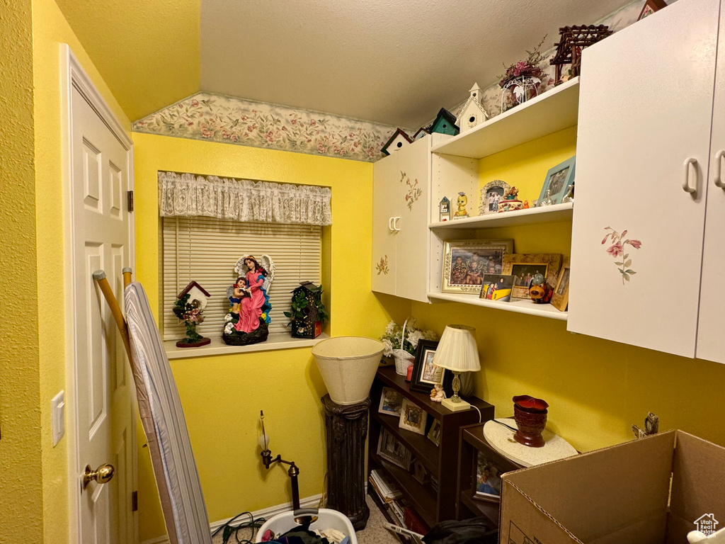Bathroom with lofted ceiling