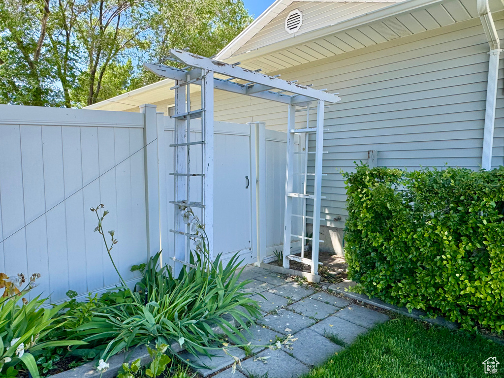 View of outdoor structure with a gate