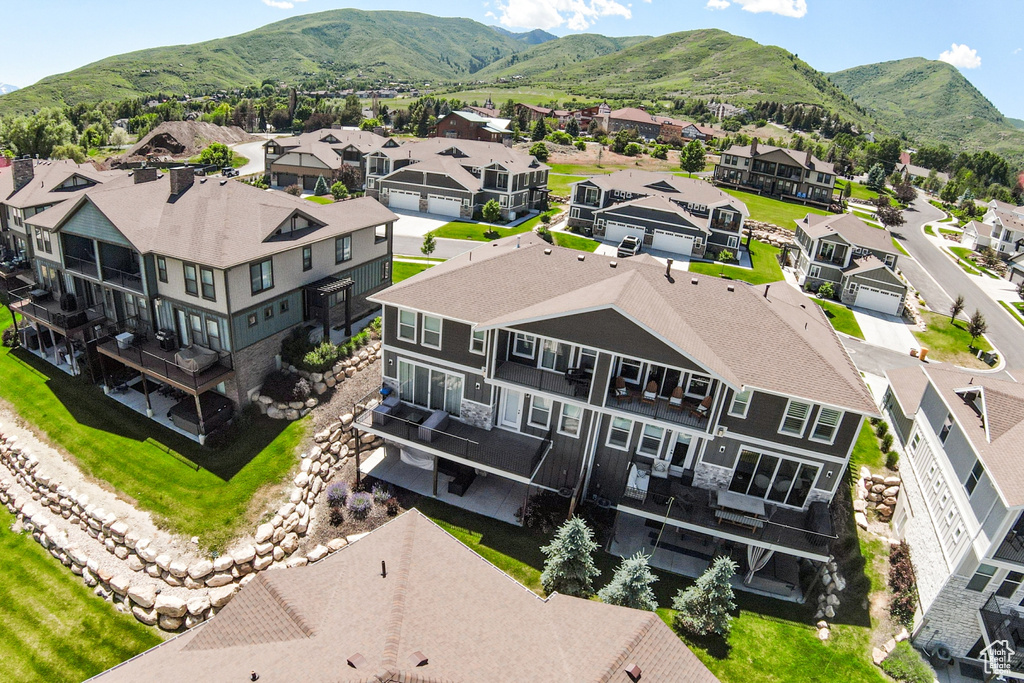 Aerial view of residential area with mountains