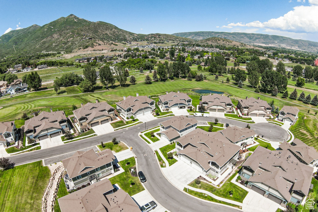 View of property location with nearby suburban area and a mountainous background