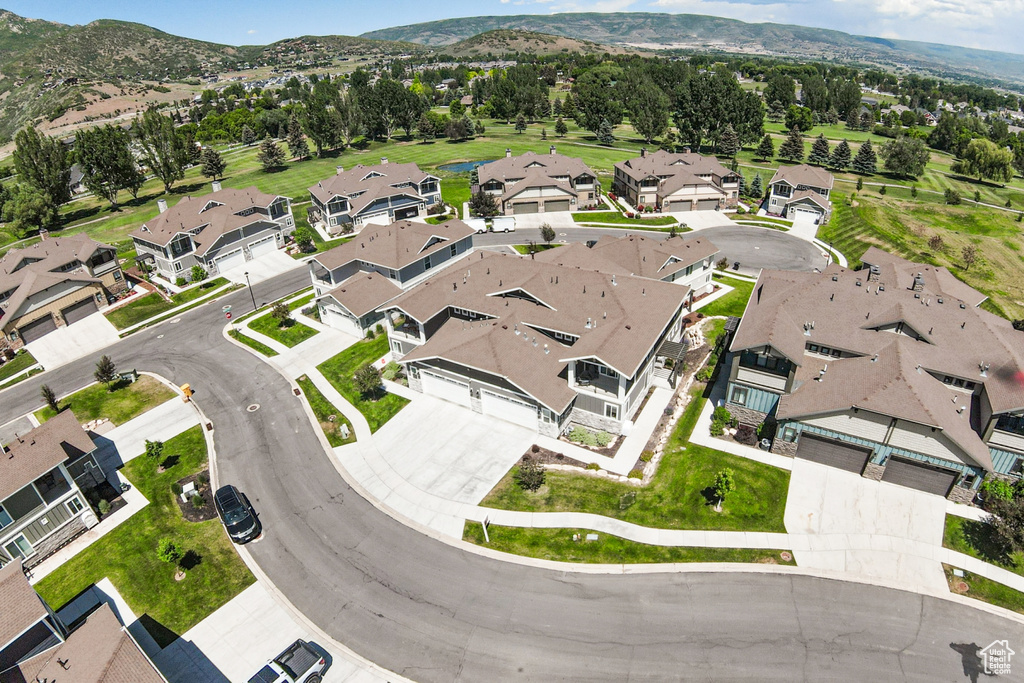 Aerial perspective of suburban area with mountains