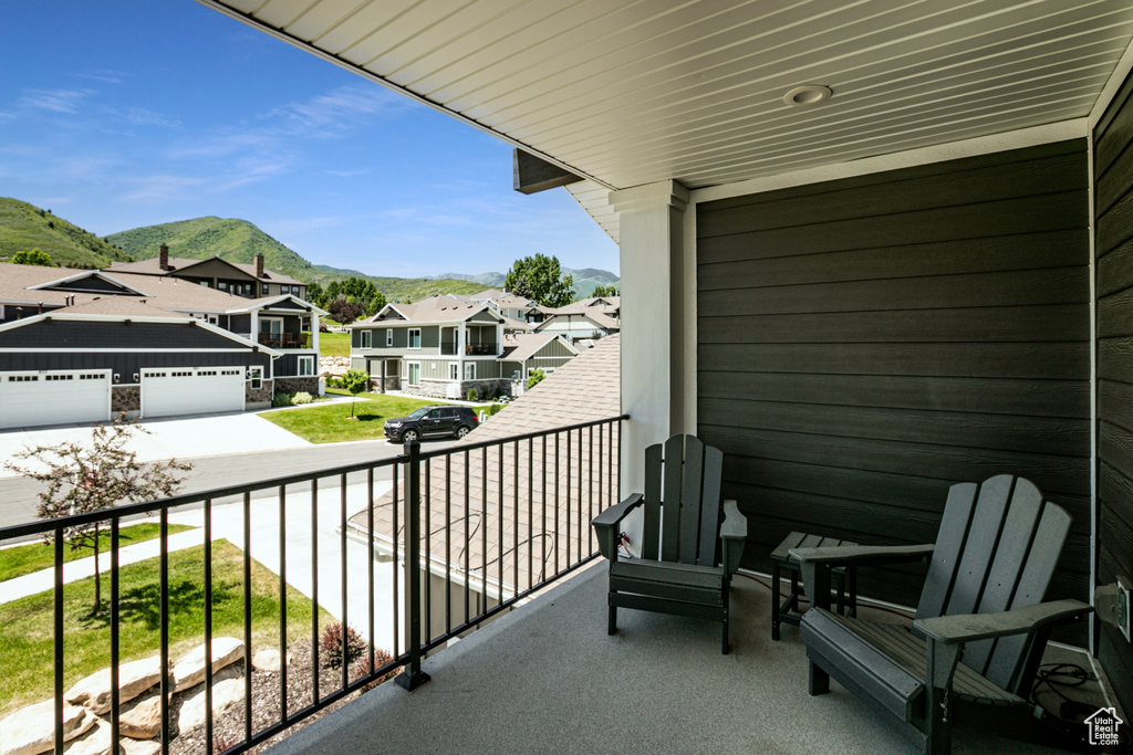 Balcony with a mountain view and a residential view