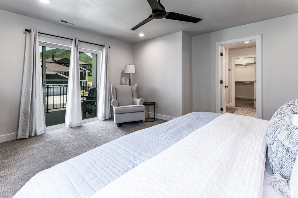 Carpeted bedroom with access to outside, recessed lighting, and ceiling fan