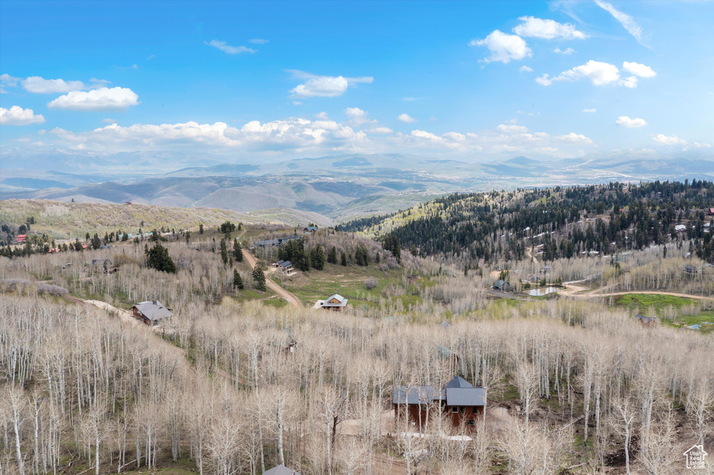 View of mountain backdrop featuring rural landscape