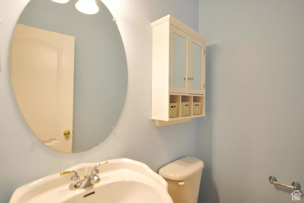 Bathroom with toilet and a sink