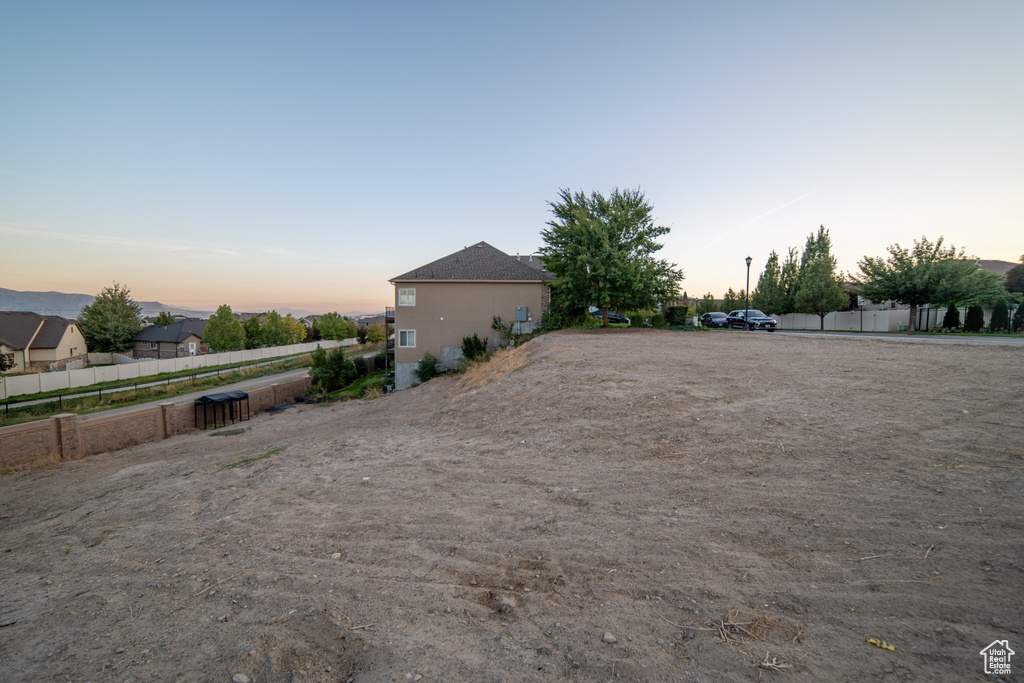 View of yard at dusk