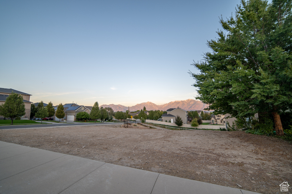 View of yard featuring a mountain view and a residential view