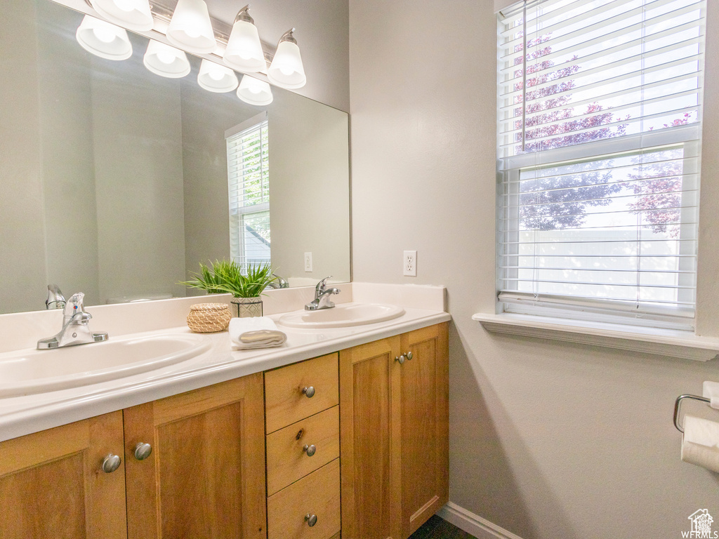Bathroom featuring double vanity