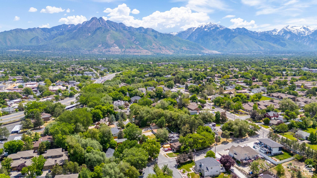 Aerial view of residential area with a mountainous background