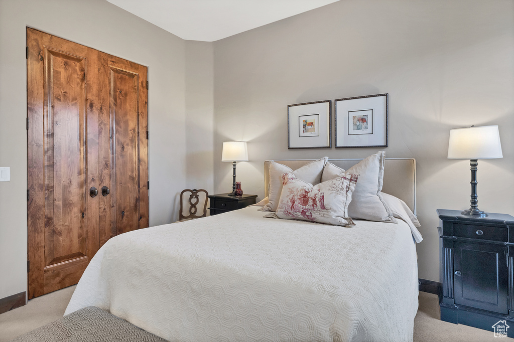 Bedroom featuring carpet flooring