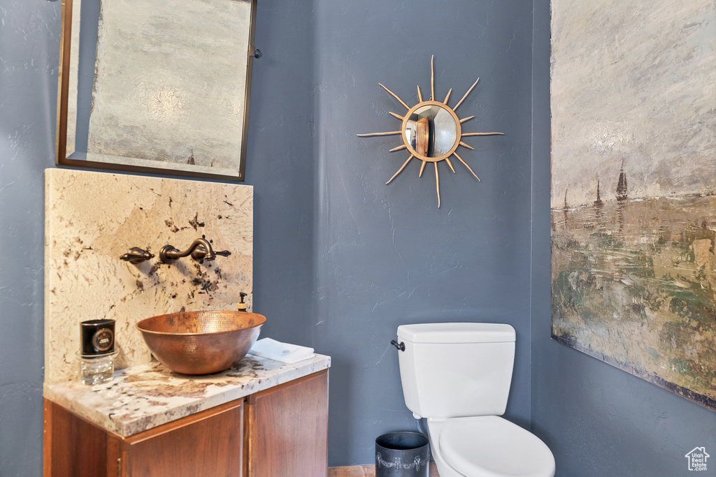 Bathroom featuring toilet and vanity