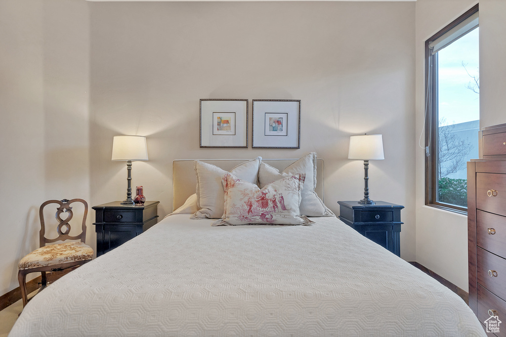Bedroom featuring baseboards