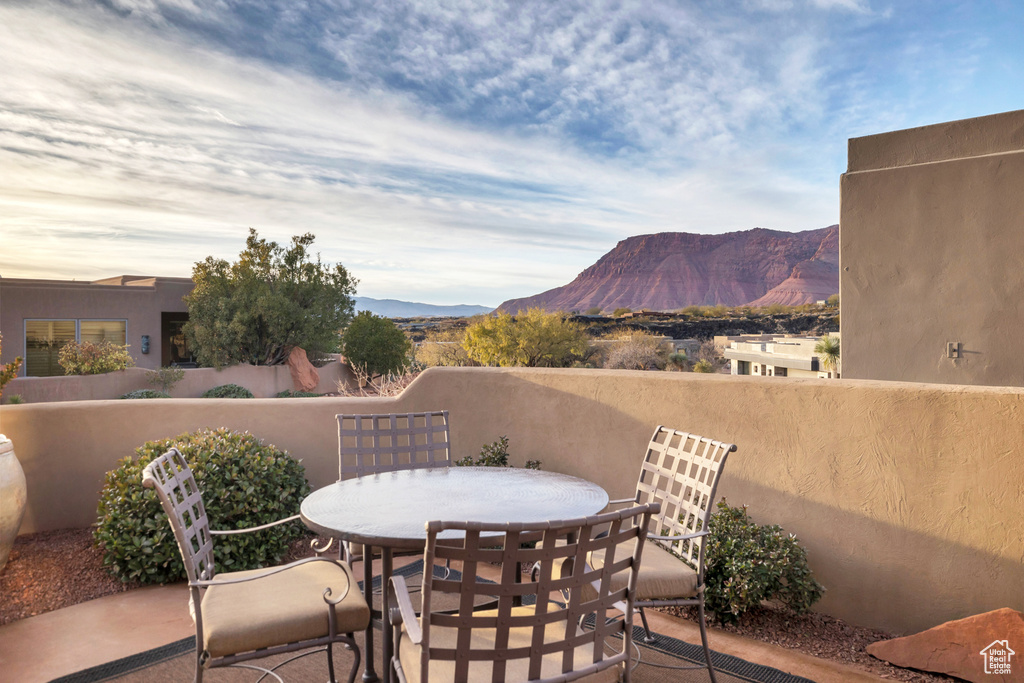 View of patio / terrace with a mountain view and outdoor dining space