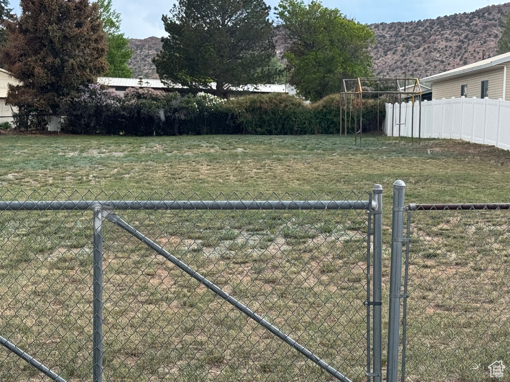 View of yard with a mountain view