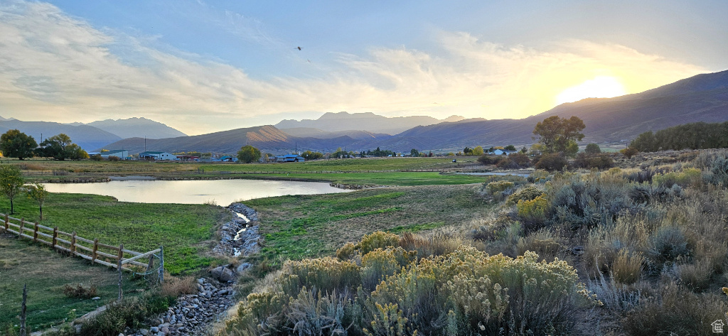 View of mountain backdrop with a large body of water