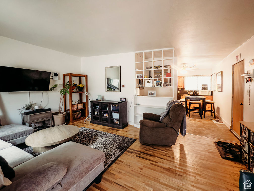 Living area featuring light wood-style floors