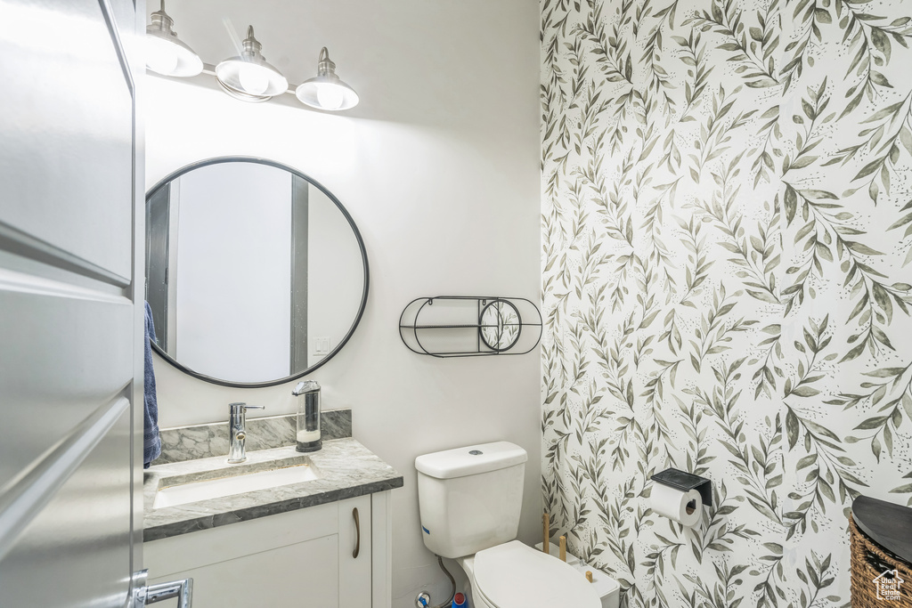 Bathroom with vanity and toilet