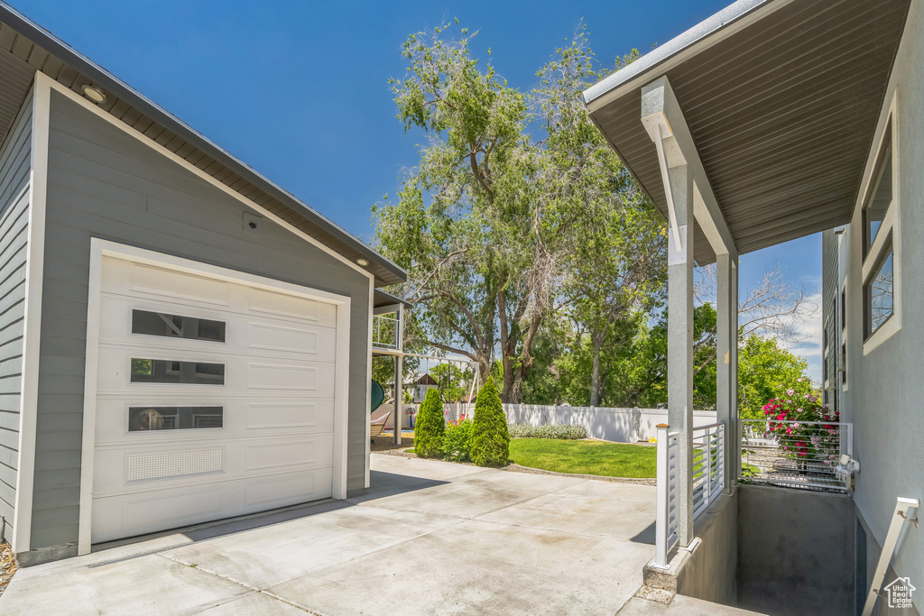 Garage featuring driveway