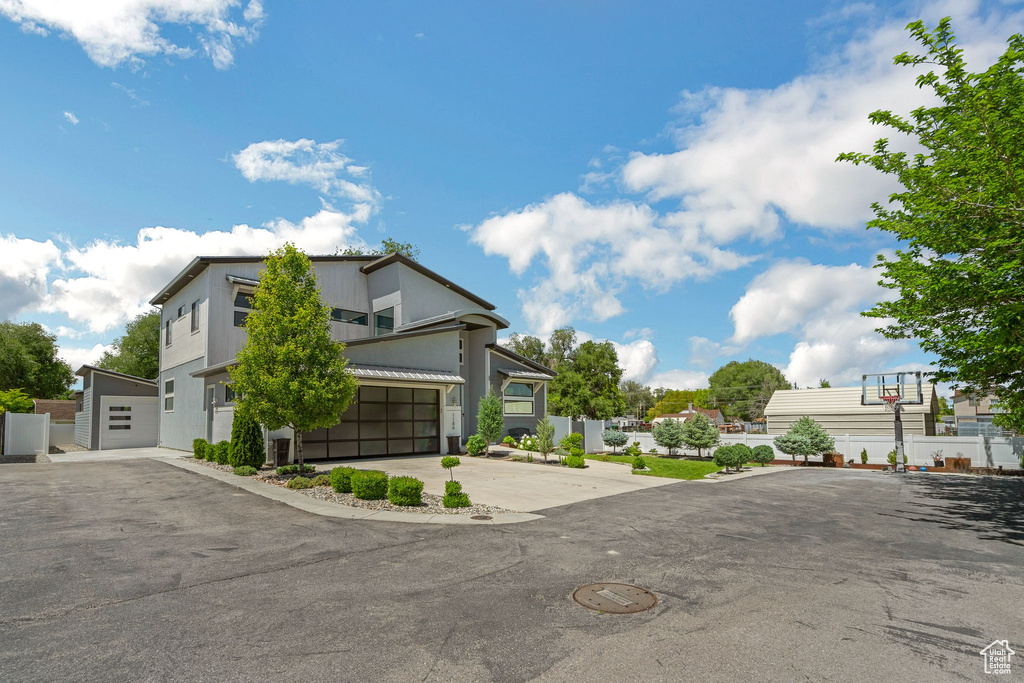 Modern home with concrete driveway