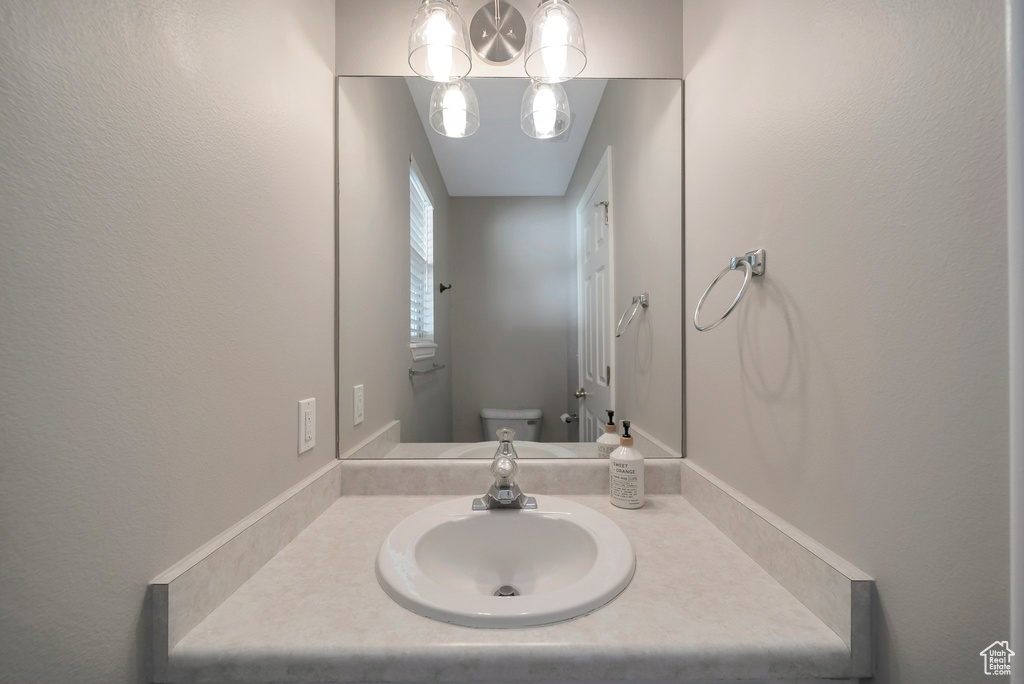 Bathroom featuring toilet and vanity