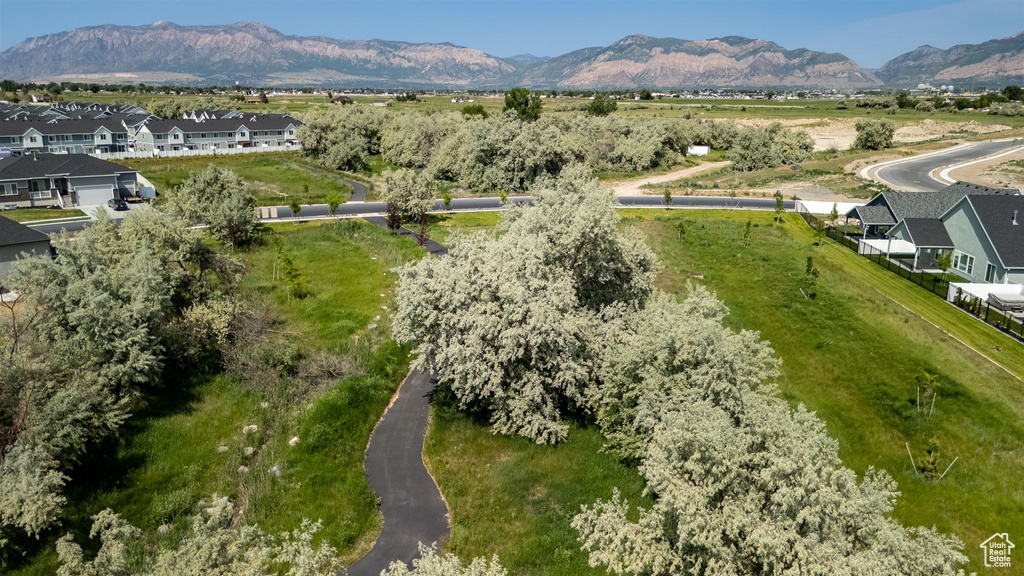 Aerial view of residential area featuring a mountain backdrop