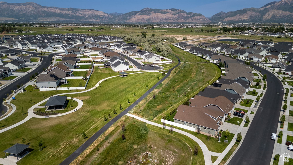 View of property location featuring nearby suburban area and a mountainous background