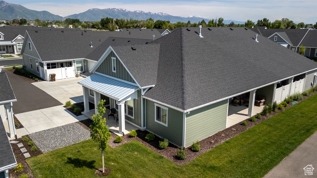 Aerial view of residential area with a mountain backdrop