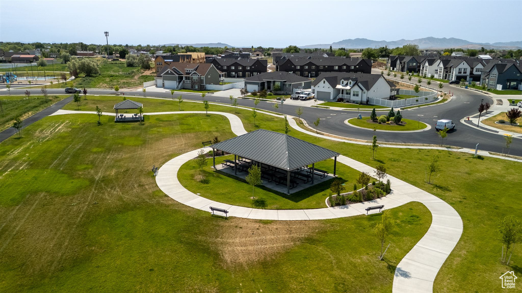 Aerial perspective of suburban area with a mountain backdrop