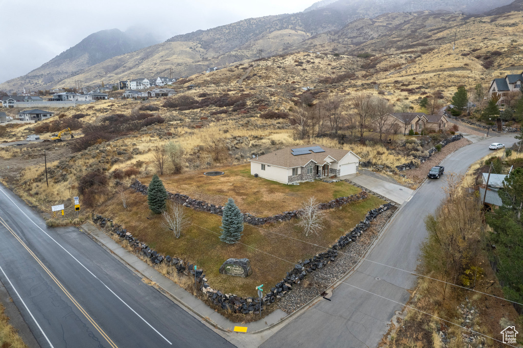 View of subject property with a mountainous background