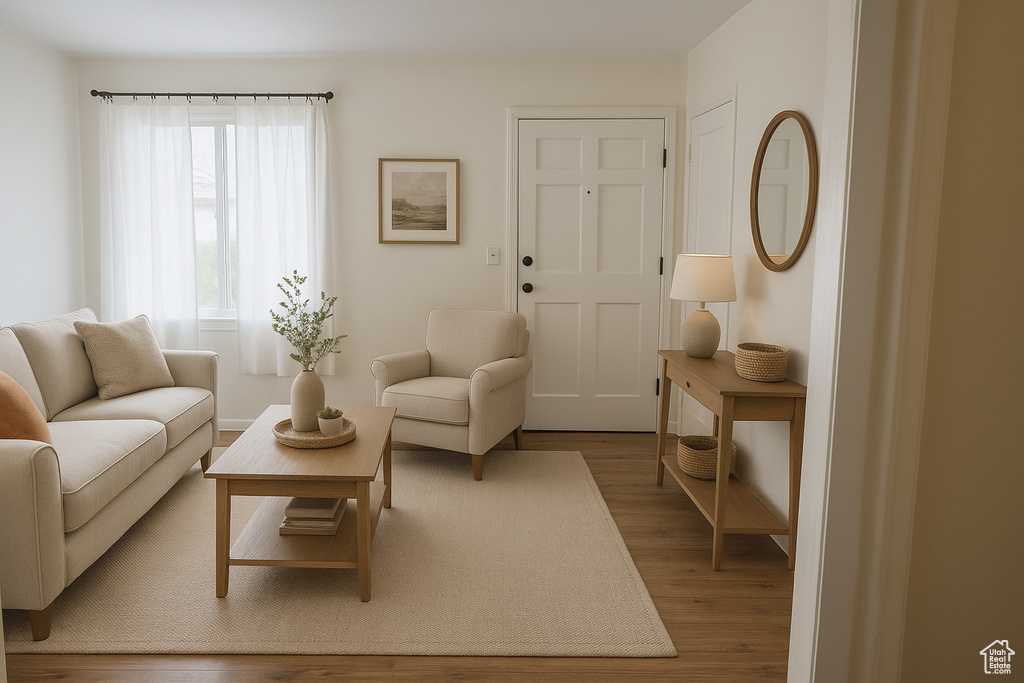 Living room featuring wood finished floors and baseboards